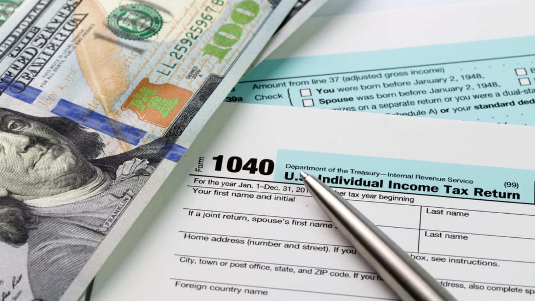 Tax refund verification, calculator, pen, form