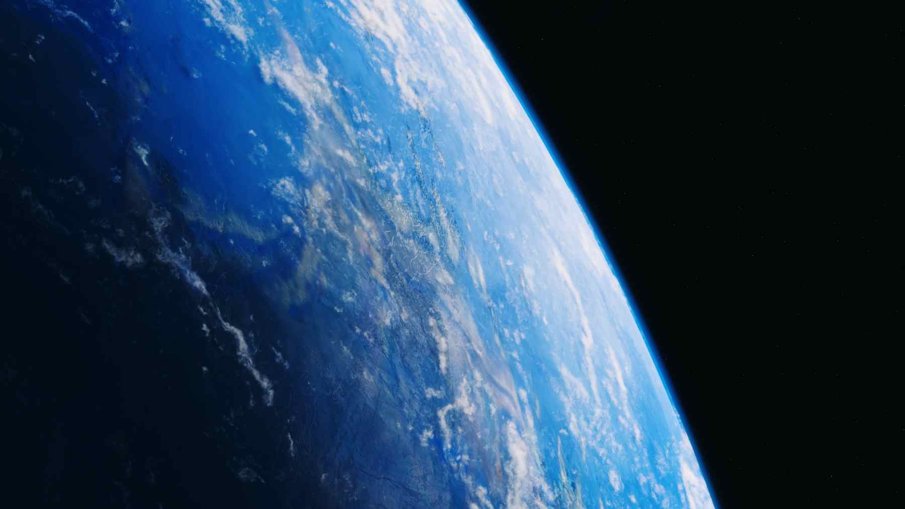 Earth from space with blue oceans and cloud bands, illustrating research that Earth’s day lasted about 19 hours for a billion years.