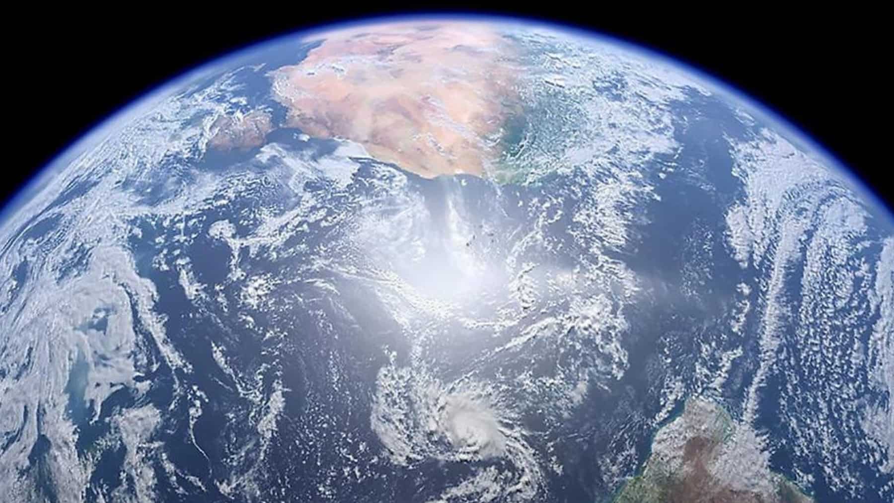 Vista del planeta Tierra desde el espacio con océanos, nubes y continentes visibles